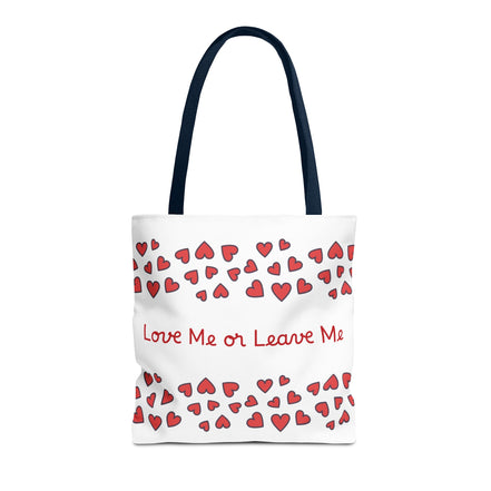 Tote bag with red heart pattern and text 'Love Me or Leave Me' on a white background