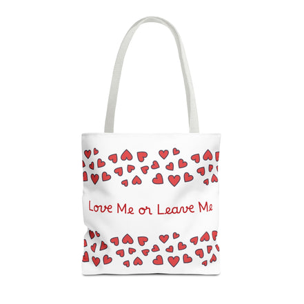 Tote bag with red heart pattern and text 'Love Me or Leave Me' on a white background