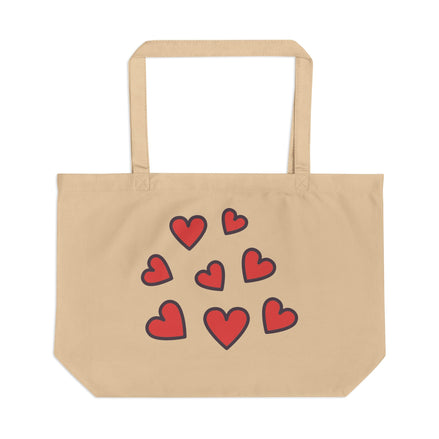 Beige tote bag with red hearts on a white background