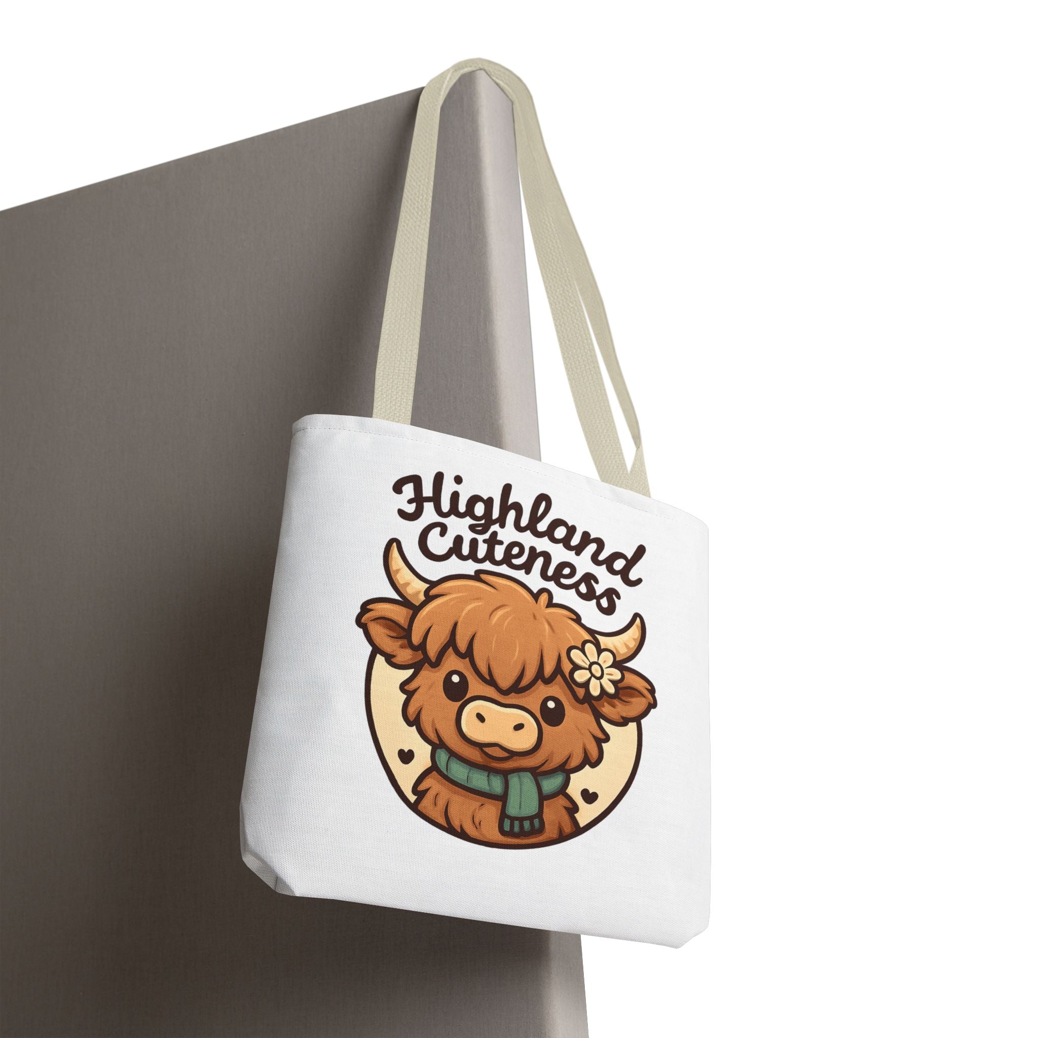 Tote bag with a cartoon highland cow and 'Highland Cuteness' text on a white background
