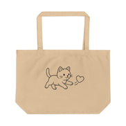 Beige tote bag with a cat and heart design on a white background