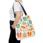 Person holding a tote bag with beach-themed designs on a white background