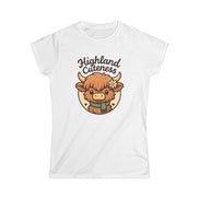 White t-shirt with a cartoon highland cow and 'Highland Cuteness' text on a white background