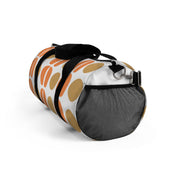 Duffel bag with orange and white pattern on a white background