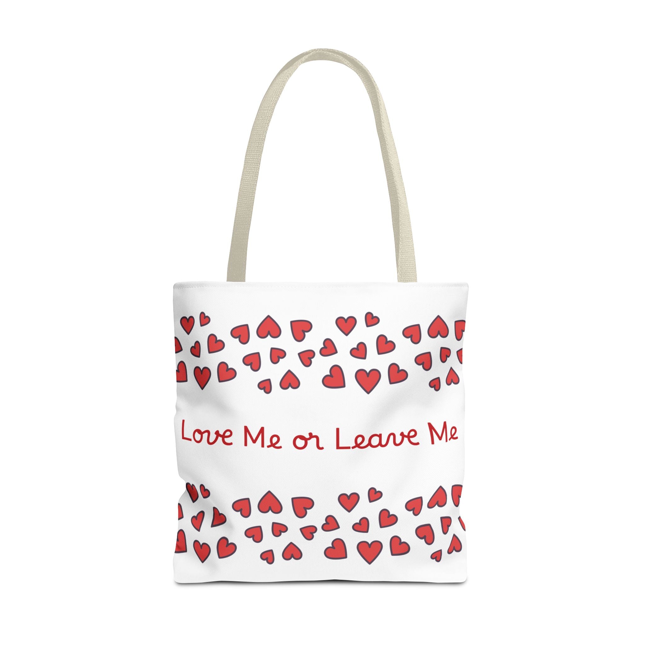 Tote bag with red heart pattern and text 'Love Me or Leave Me' on a white background