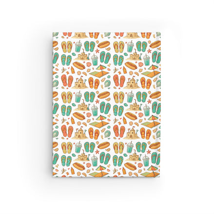 Notebook with a colorful beach-themed pattern on a white background
