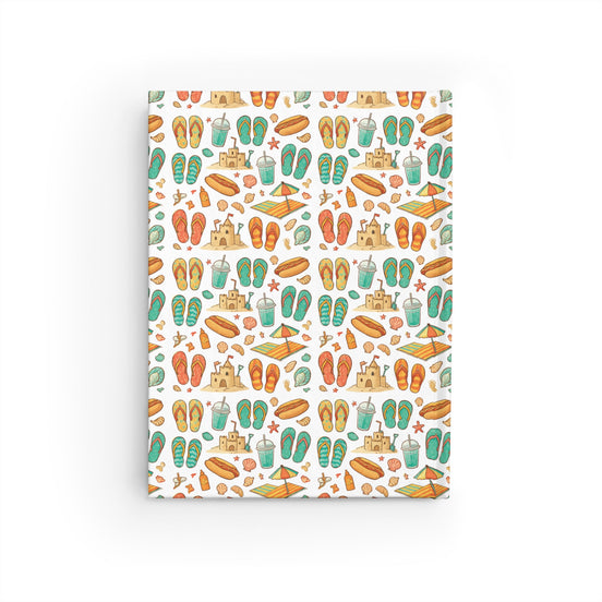 Notebook with a colorful beach-themed pattern on a white background
