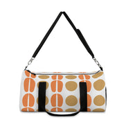 Duffel bag with orange and brown abstract pattern on a white background