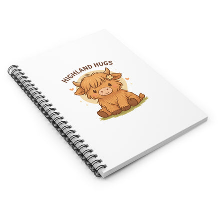 Notebook with a cartoon highland cow and 'Highland Hugs' text on a white background