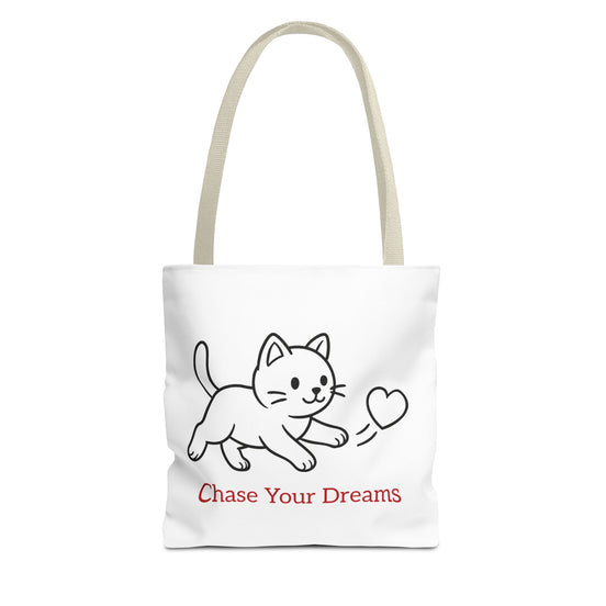 White tote bag with a beige handle and cat illustration and 'Chase Your Dreams' text on a white background