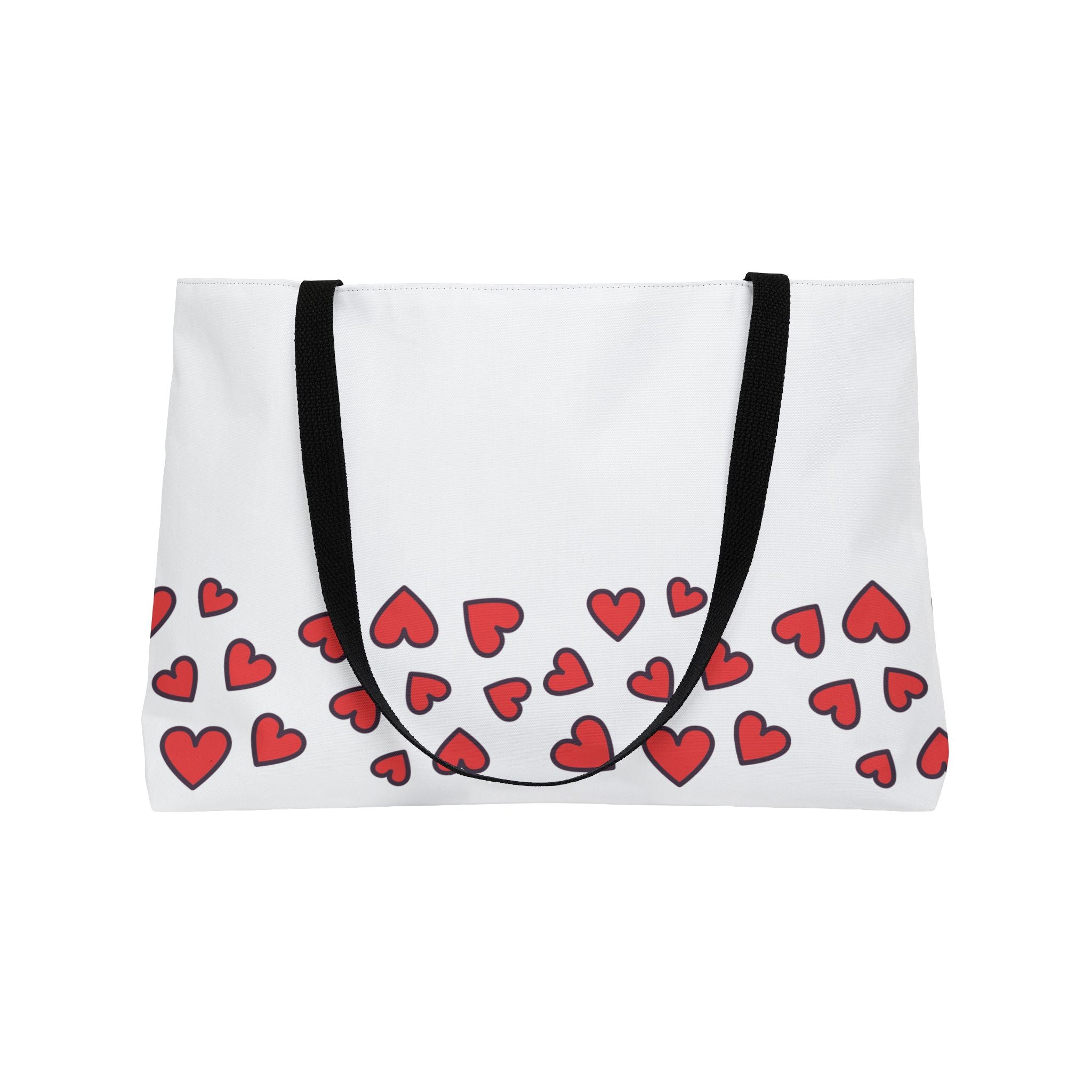White tote bag with red heart pattern and black straps on a white background