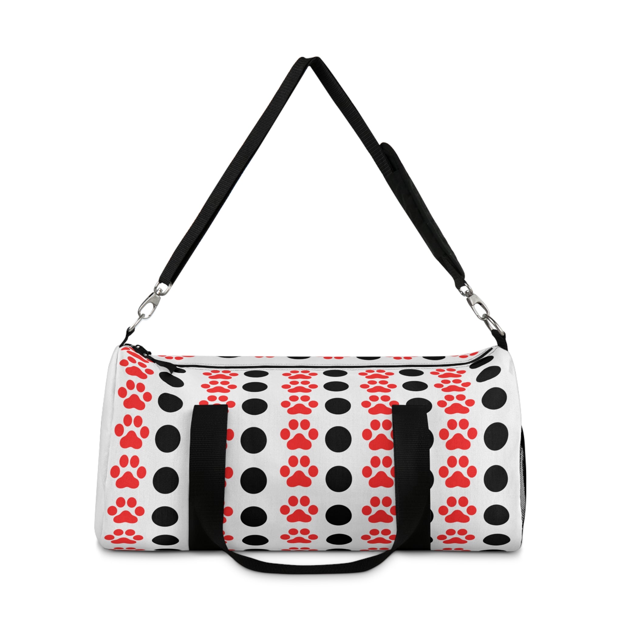 Duffel bag with black polka dots and red paw prints on a white background