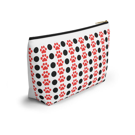 Pouch with red paw prints and black polka dots on a white background