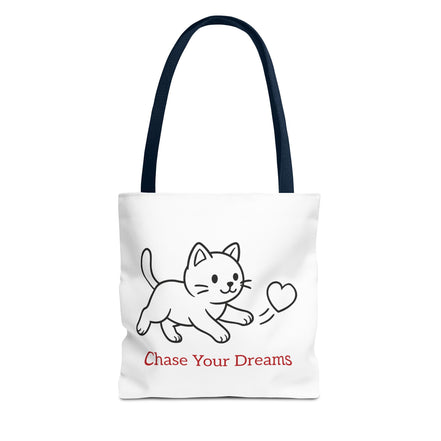 Tote bag with a dark blue handle and cat illustration and 'Chase Your Dreams' text on a white background