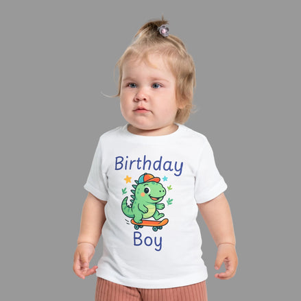 Child wearing a white t-shirt with a dinosaur graphic and text on a white background