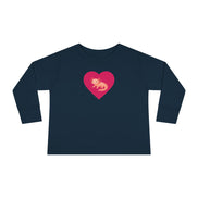 Navy blue long-sleeve shirt with a pink heart and graphic on a white background