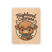 Jigsaw puzzle with a cartoon highland cow and 'Highland Cuteness' text on a beige background