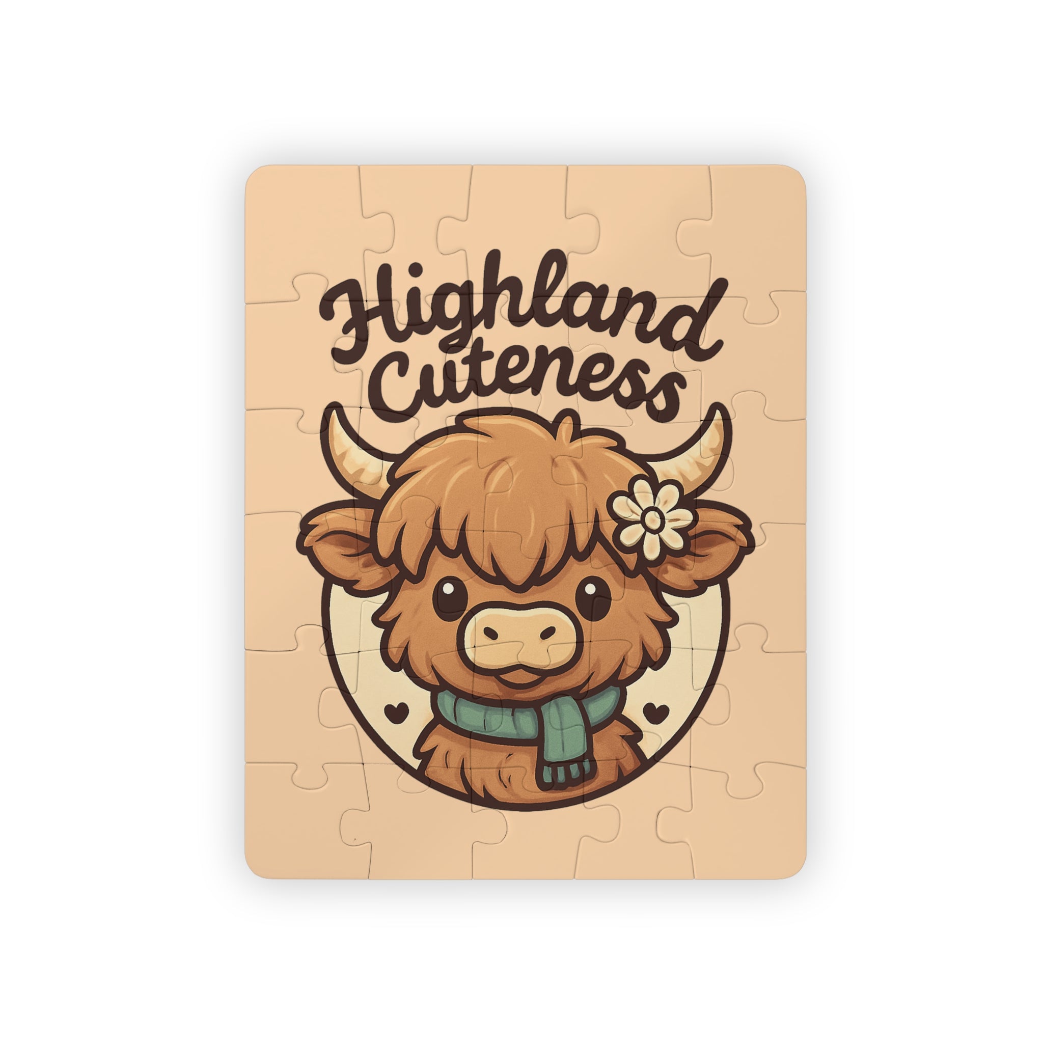 Jigsaw puzzle with a cartoon highland cow and 'Highland Cuteness' text on a beige background