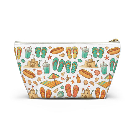 Pouch with beach-themed pattern featuring flip-flops, sandcastles, and drinks on a white background