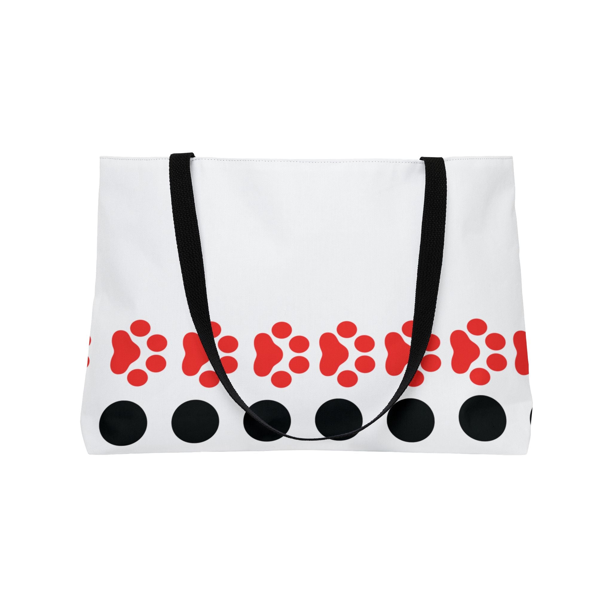 White tote bag with red paw prints and black circles on a white background