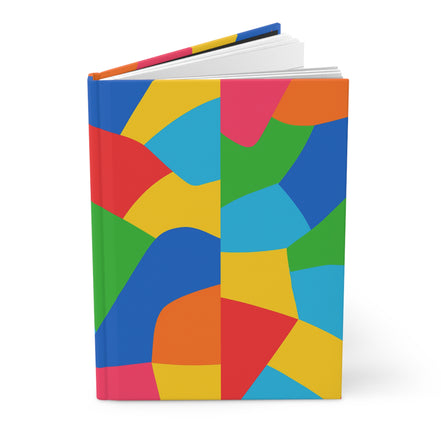 Colorful geometric patterned notebook on a white background