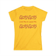 Yellow t-shirt with red heart pattern and text 'Love Me or Leave Me' on a white background