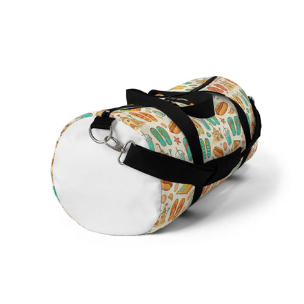 Duffel bag with a colorful pattern and black strap on a white background