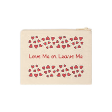 Beige pouch with red hearts and text 'Love Me or Leave Me' on a white background