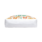 White rectangular cushion with colorful footprints on a white background