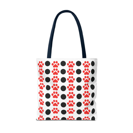 Tote bag with red and black paw print pattern on a white background