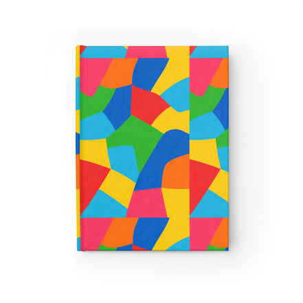 Colorful geometric patterned notebook on a white background
