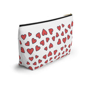 White pouch with red heart pattern on a white background