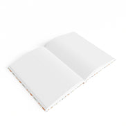 Open notebook with white pages on a white background