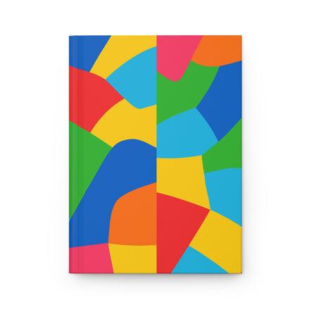 Colorful geometric patterned notebook on a white background