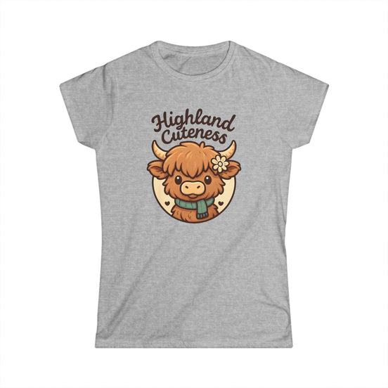 Gray t-shirt with a cartoon Highland cow and 'Highland Cuteness' text on a white background
