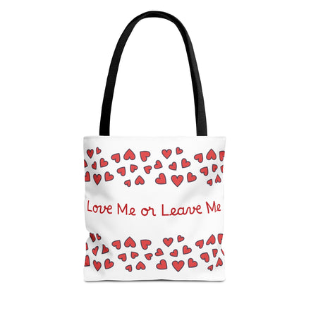 Tote bag with red hearts and text 'Love Me or Leave Me' on a white background