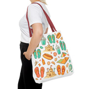 Person holding a tote bag with beach-themed designs on a white background