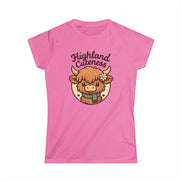 Pink t-shirt with a cartoon Highland cow and 'Highland Cuteness' text on a white background