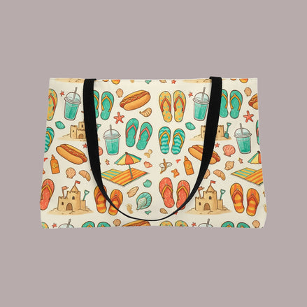 Beige tote bag with beach-themed pattern featuring flip-flops, sandcastles, and umbrellas on a white background.