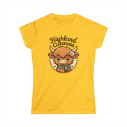 Yellow t-shirt with a cartoon Highland cow and 'Highland Cuteness' text on a white background