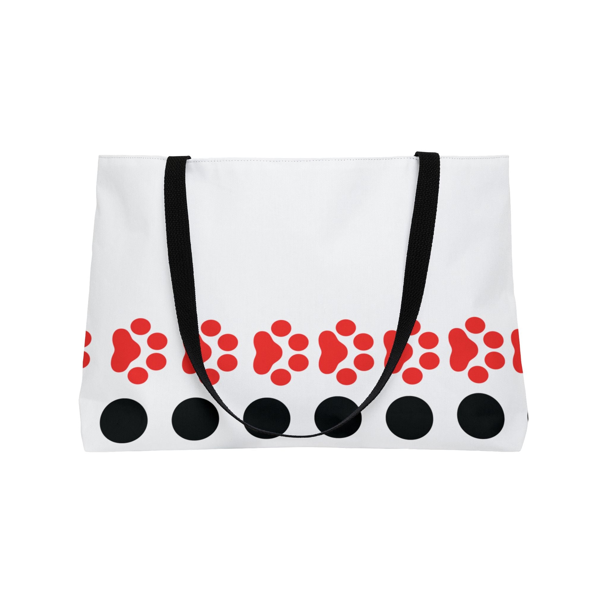 White tote bag with red paw prints and black circles on a white background