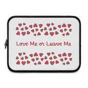 Laptop sleeve with red hearts and text 'Love Me or Leave Me' on a white background