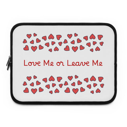 Laptop sleeve with red hearts and text 'Love Me or Leave Me' on a white background