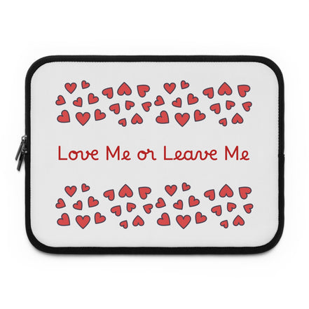 Laptop sleeve with red hearts and text 'Love Me or Leave Me' on a white background