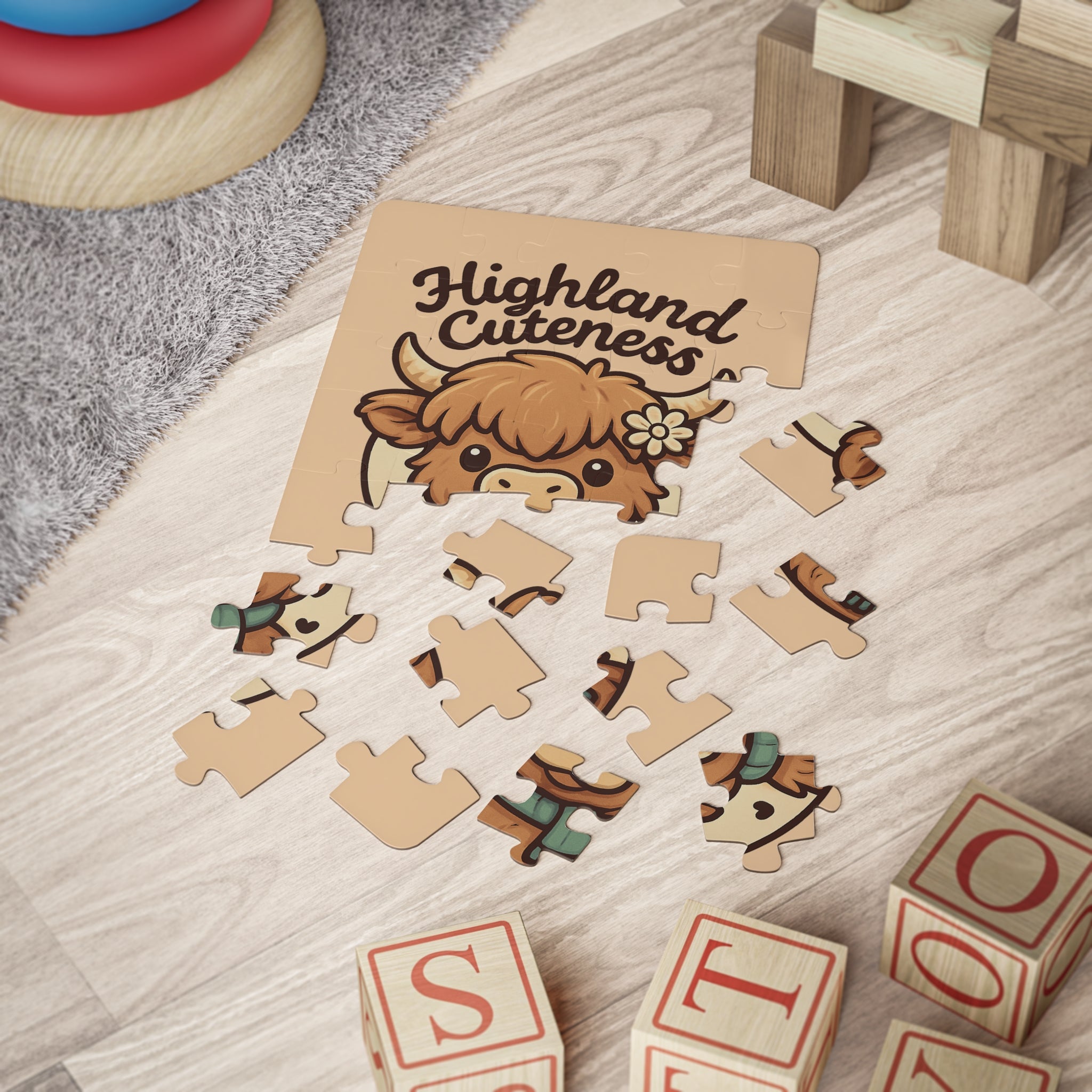 Highland Cuteness 30-piece kids puzzle adorable Highland cow toddler jigsaw. Wooden puzzle with Highland cow design and 'Highland Cuteness' text on a wooden surface.