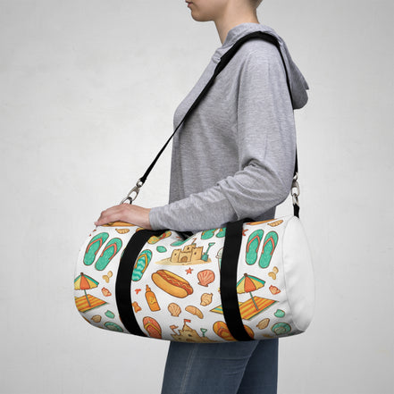 Person carrying a duffel bag with colorful patterns on a plain background small version