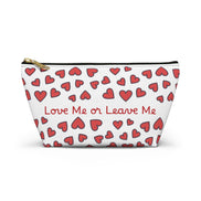 Pouch with red heart pattern and 'Love Me or Leave Me' text on a white background